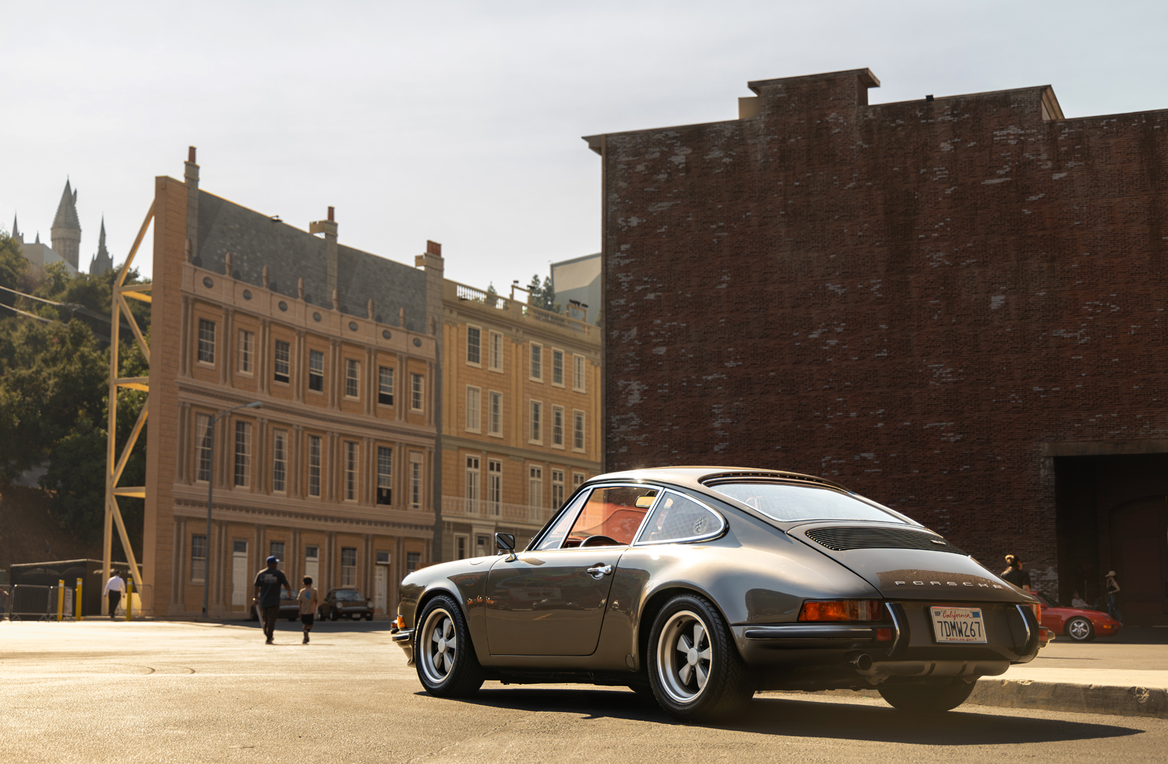 Grey porsche rear quarter view in movie set lot